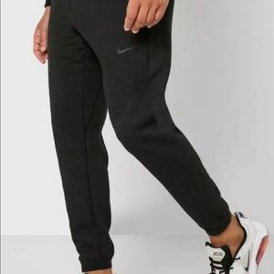 NIKE SPORTSWEAR TECH PACK FLEECE PANTS